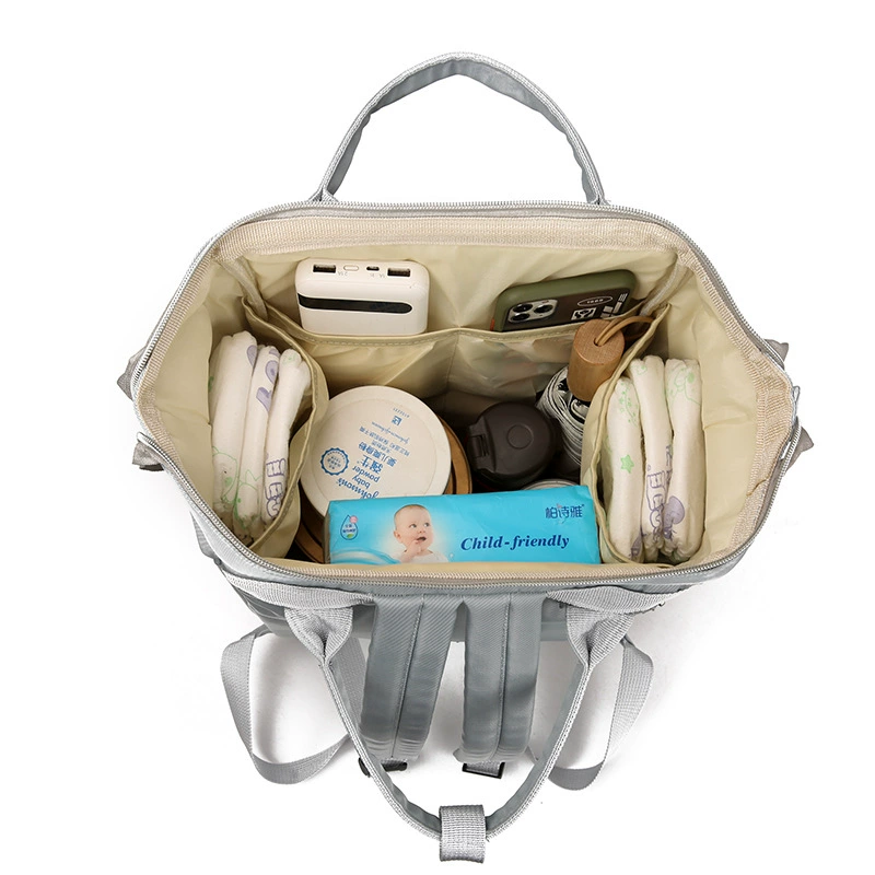 Capacious shoulder bag for mother and baby, storage system, universal backpack