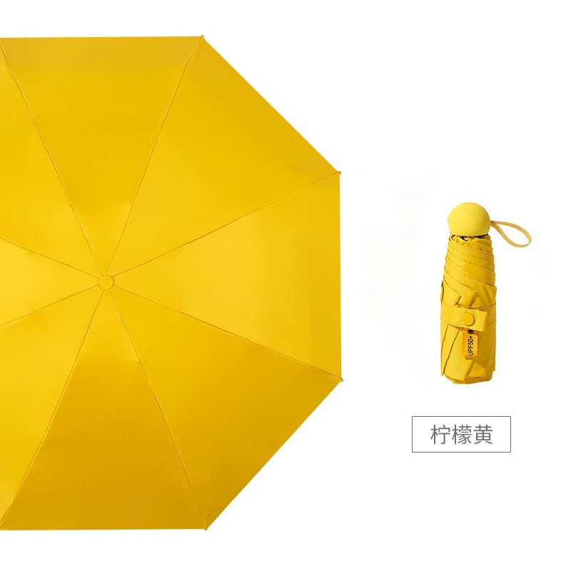 50% de descuento paraguas de cápsula de seis huesos paraguas de Sol de doble uso pequeño paraguas de bolsillo portátil simple pegamento negro paraguas de protección solar al por mayor