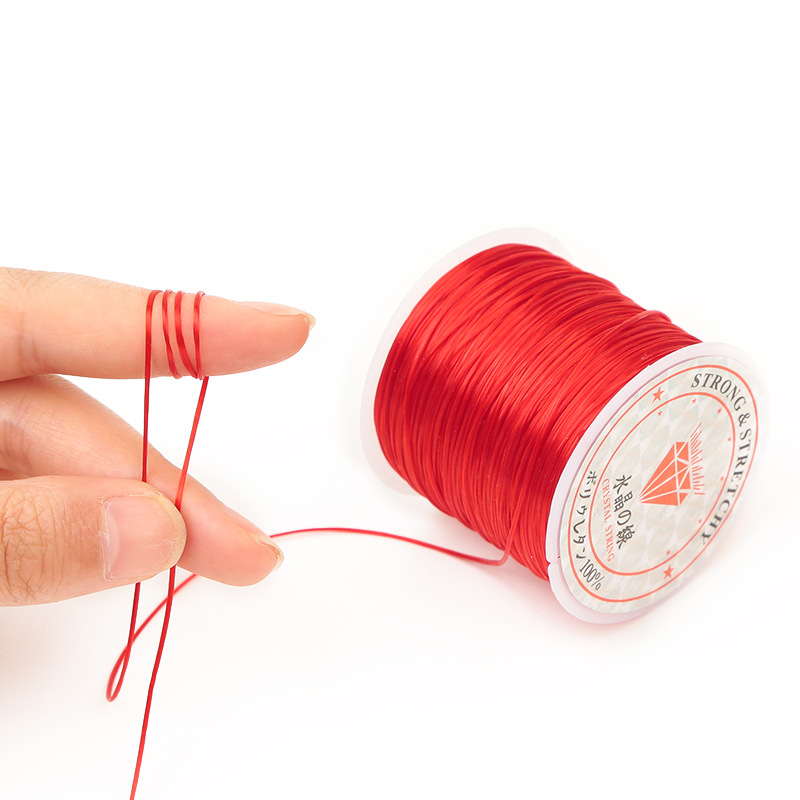 Suministro 0,8mm cuentas de cristal planas hilo elástico extensión del pelo accesorios DIY material de cuentas cuerda pulsera cuerda al por mayor