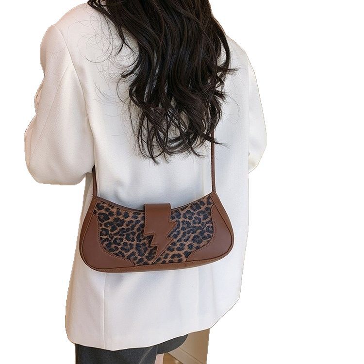 Diseño original bolso de brazo de mujer nueva textura mochila de hombro bolsa de moda personalidad media luna