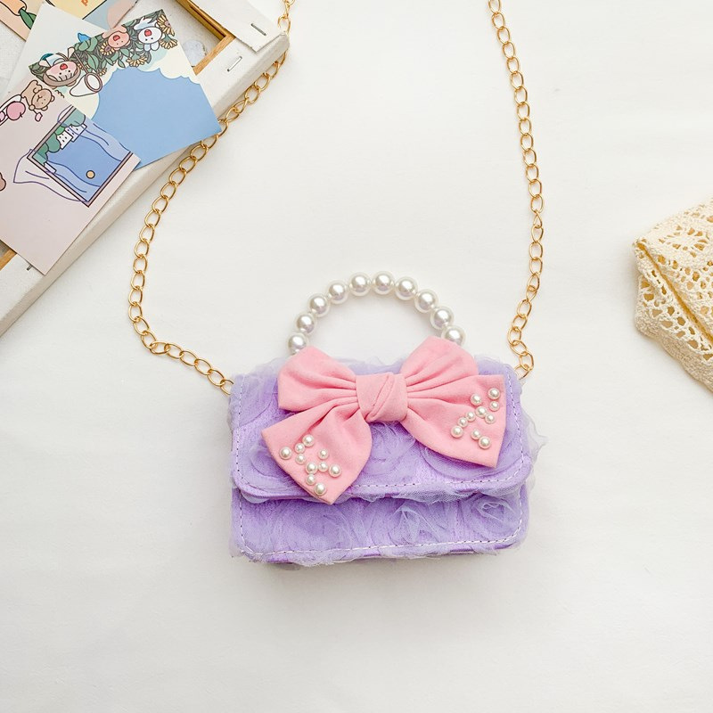 Dulce princesa bolso de hombro de perlas portátiles 2025 mini bolso de cadena de arco para niños