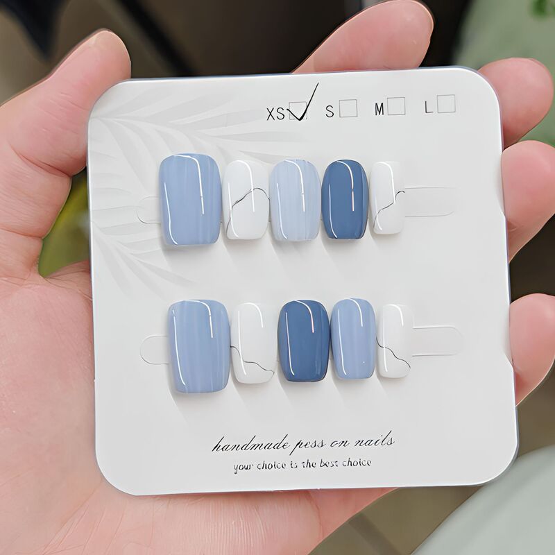 Handmade premium press-on nails for cross-border trade, featuring a brightening effect, hand-painted lines, simple design, and a striking blue color in a short style Handmade premium press-on nails for cross-border trade, featuring a brightening effect, hand-painted lines, simple design, and a striking blue color in a short style
