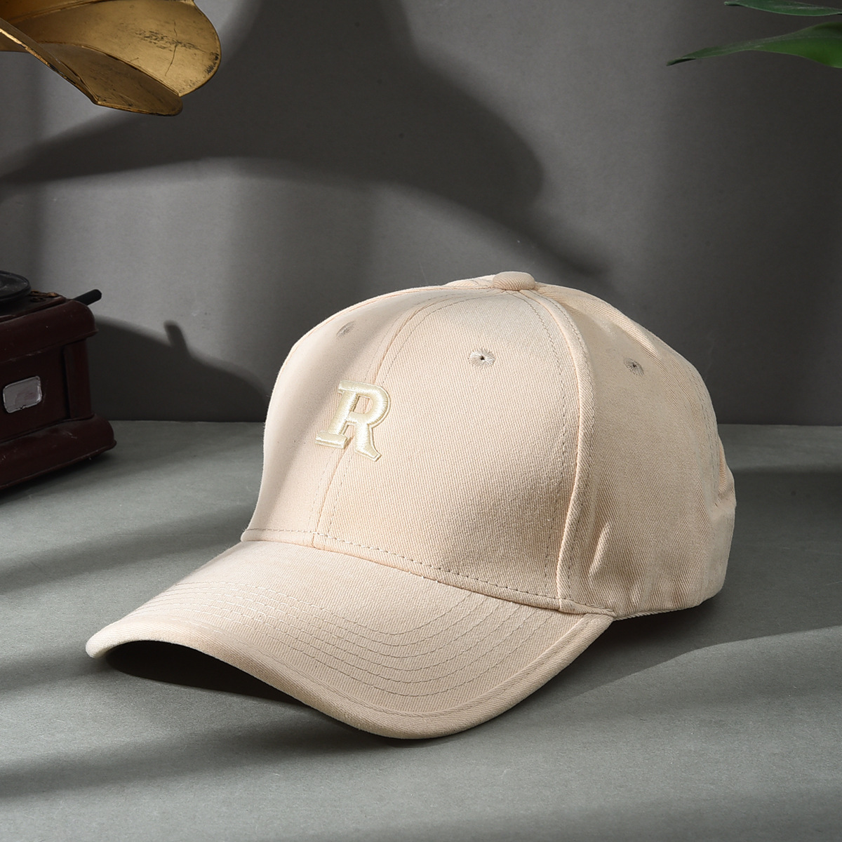 Versión de elevación R sombrero de estilo coreano sombrero de béisbol molido sombrero de béisbol de otoño y invierno sombrero de boca de pato cara pequeña