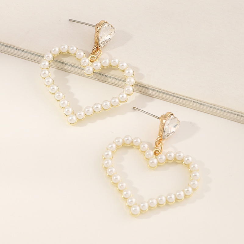 Fashion Round Five-pointed Star Pearl Earrings display picture 3