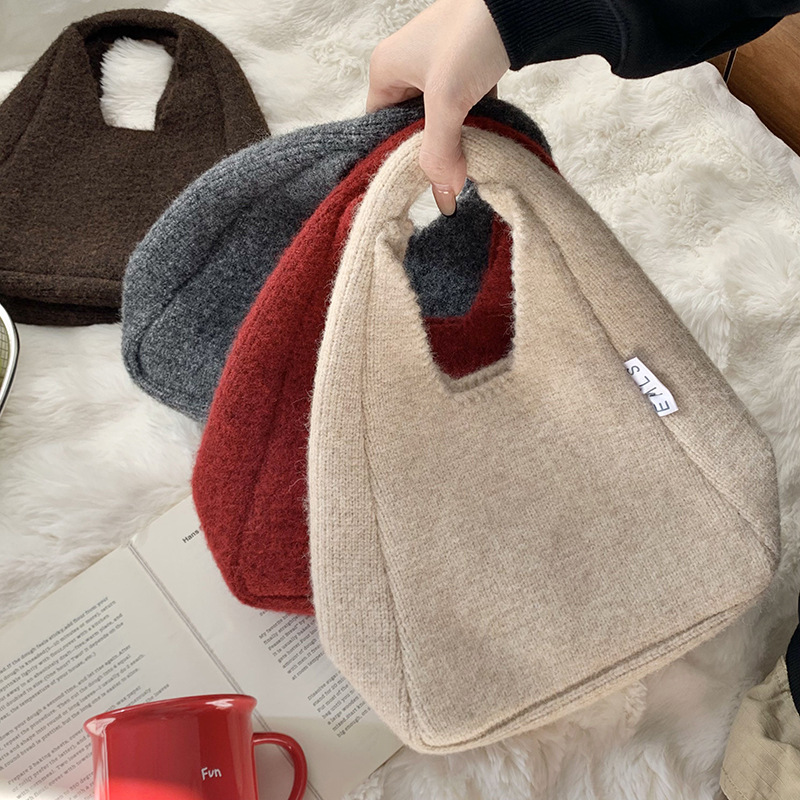 Nuevo otoño y invierno con bolso de lana, bolso de lana de mujer, estilo coreano de alta calidad, simple y versátil bolso de viaje de color sólido.
