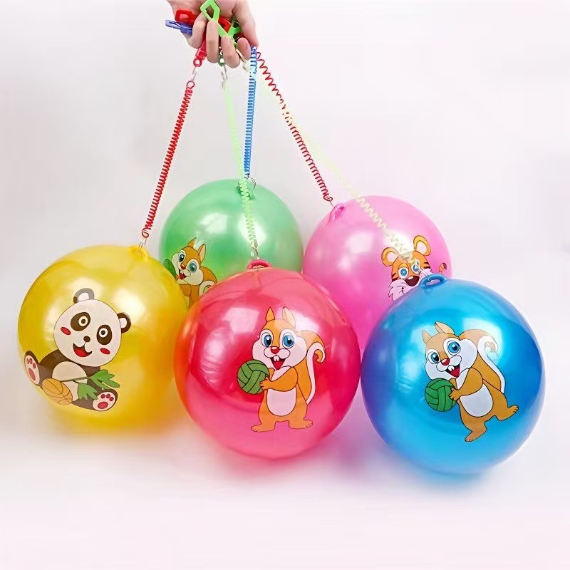 Mayorista juguetes para niños en venta caliente mercado nocturno colorido con cuerda bola elástica inflada cadena de fútbol de dibujos animados sandía bola