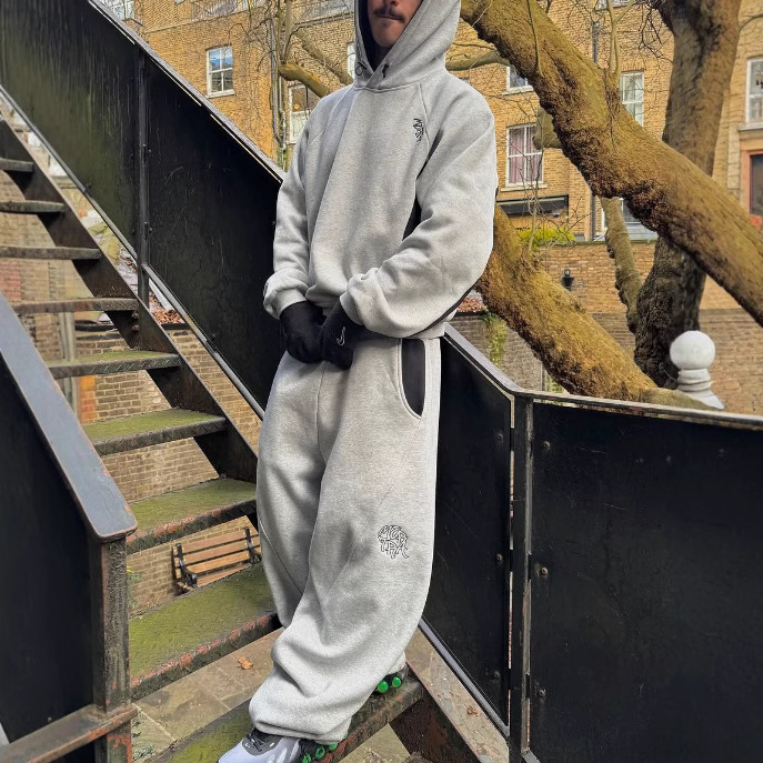 Europa y Estados Unidos transfronterizos americanos retro versátil suelto hip-hop empalme bordado pantalones de hombre comercio exterior