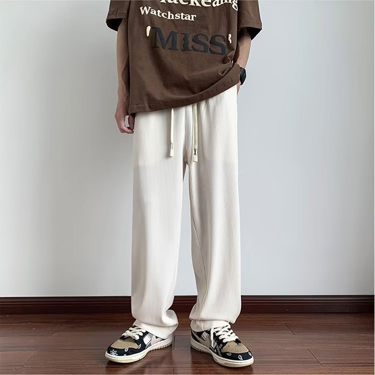Verano delgado hombre 2026 nueva tendencia confortable pull-out pantalones largos de piernas largas pantalones de chicos rectos sueltos