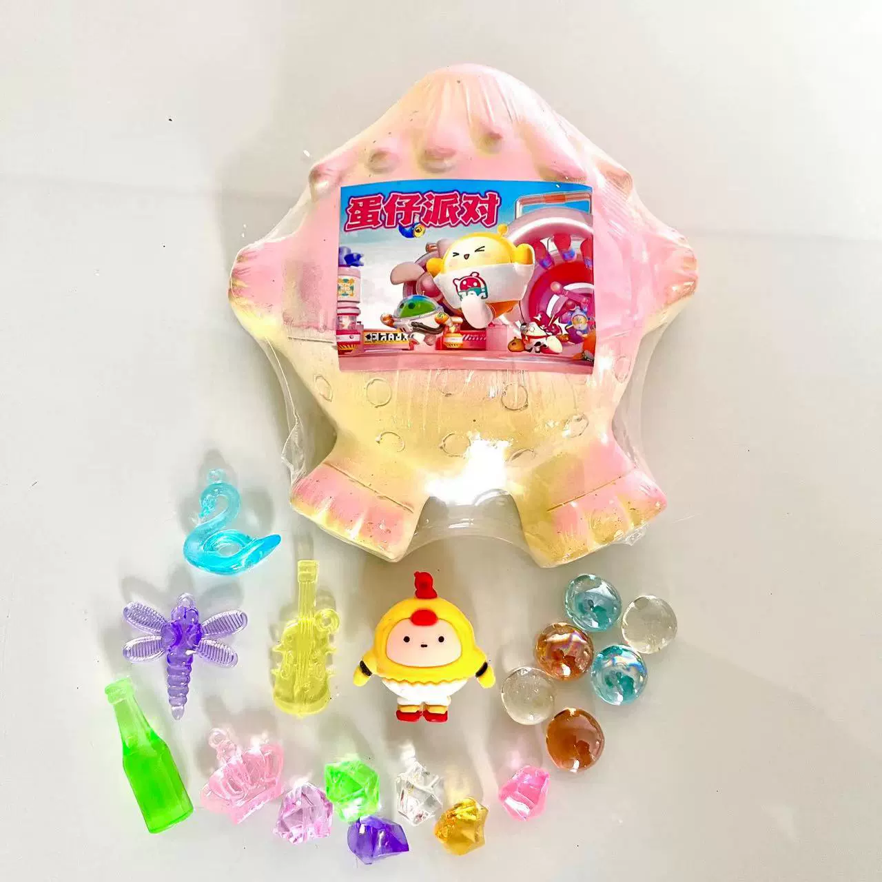 Archeological toy, mermaid, with gem