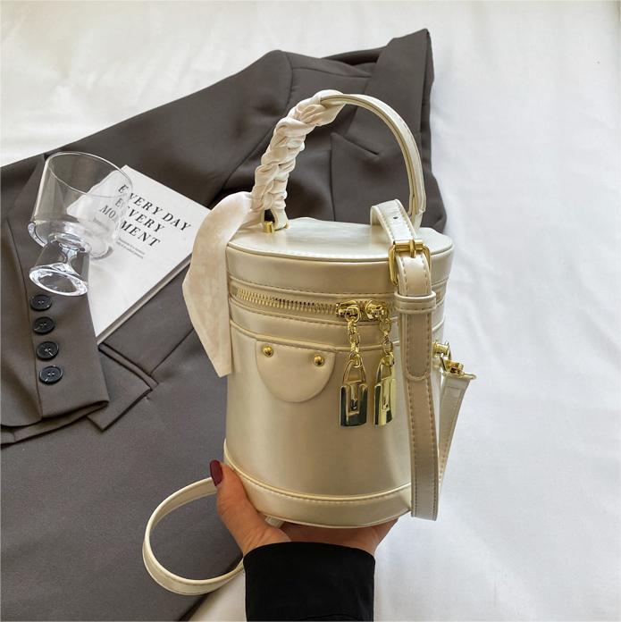 Este año, la popular explosión de bolsas de cubo de mano 2024 nuevo bolso de mujer, nicho de alto nivel, bolso de hombro, bolso de mochila universal