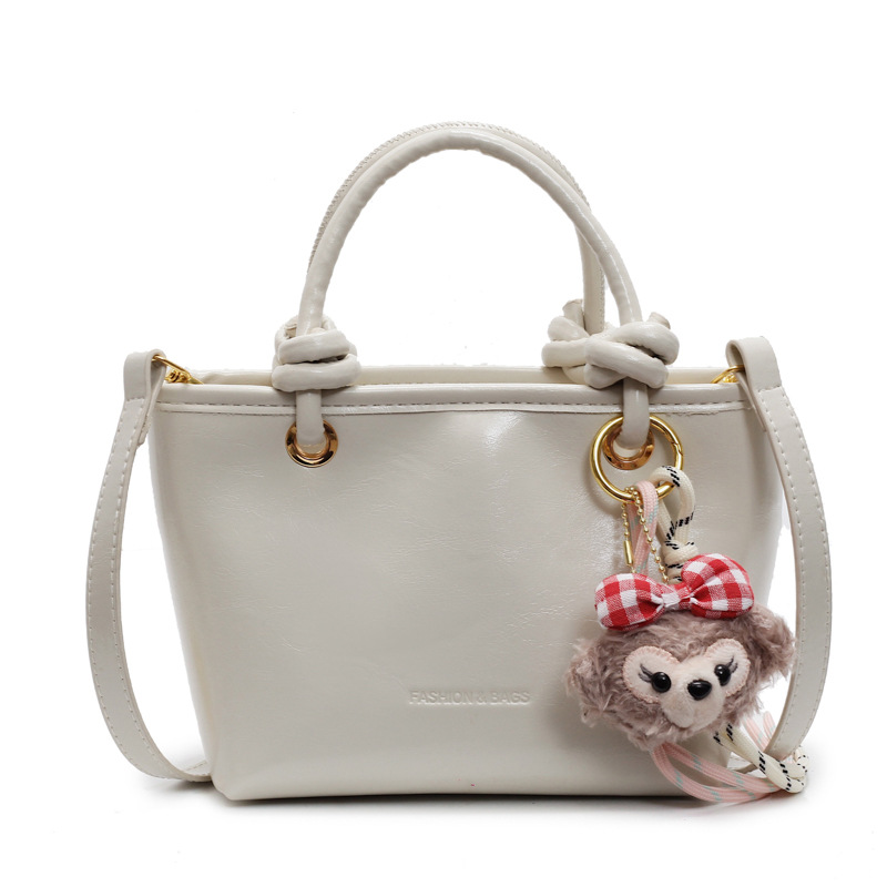 Este año popular bolso de cubo de mano caliente 2025 nuevo bolso de mujer bolso de hombro casual versátil bolso de alta calidad