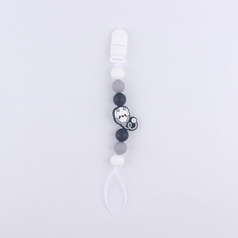 Nuevo bebé suministros chupete cadena creativa DIY dibujos animados estetoscopio pan cuerno mordedor cadena anti-gota