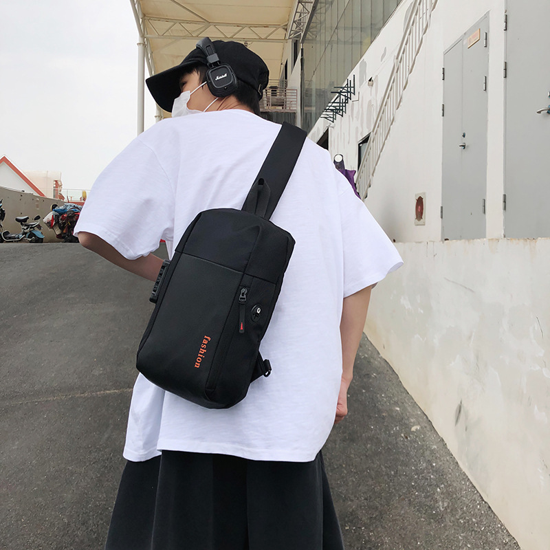 廠家直銷車縫線男士單肩包時尚印花字母斜跨包大容量PU運動腰包男