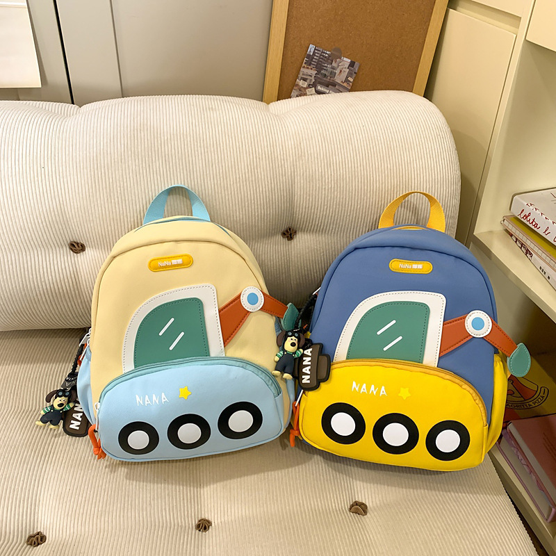 Jardín de infantes mochila escolar ligera para mujeres 2025 nueva caricatura encantadora excavadora mochila para hombres mochila de primavera