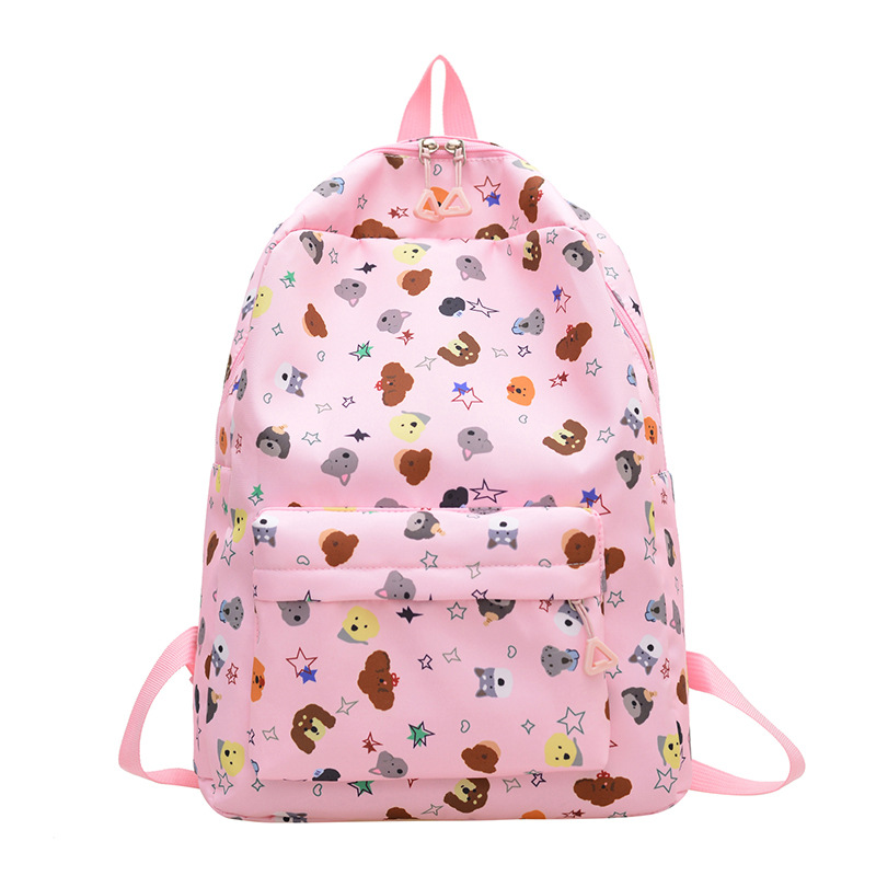 La nueva mochila con estampado de dibujos animados simple reduce la carga de los estudiantes de primaria y secundaria, pequeña mochila escolar fresca, mochila de viaje de ocio