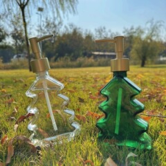 クリスマスツリーの洗面器の分注ローションの瓶の空の瓶の入浴剤のクリスマスツリーは押して瓶の石鹸器を分けます。