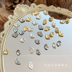 爆発金の不規則なバロック金属のネイルアクセサリーは洗練されていてシンプルで、純色の服装甲小アクセサリー卸売りをしている
