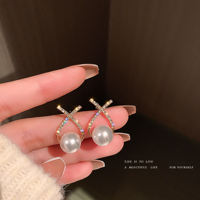 Silver needle inlaid pearl X -shaped crossfish tail water drop earrings