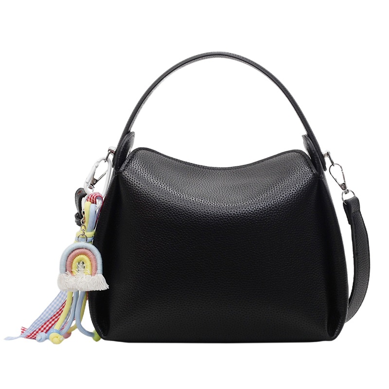 Bolso pequeño de mano para mujer 2025 nuevo bolso de mensajero de hombro de moda de lujo ligero bolso de caja de almuerzo de alta gama de nicho bolso de cubo