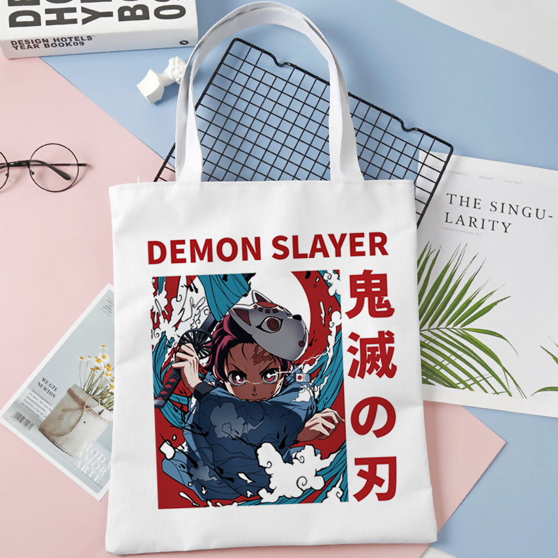 Comercio exterior transfronterizo Demon Slayer impresa bolsa de lona Harjuku bolsa de hombro bolsa de compras portátil de moda para estudiantes