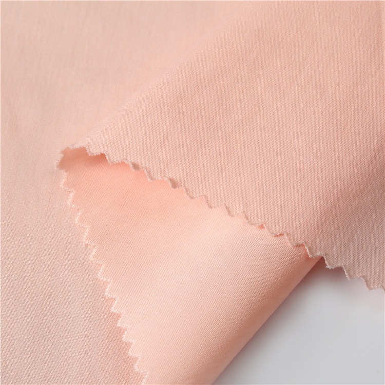 Nuevo tejido mezclado de alta elasticidad, tejido plano barato, tela de ropa suave de color sólido
