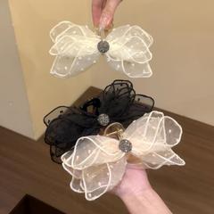 フレンチスタイルのレースリボンヘアピン2025新しいハイエンド後頭部ハーフタイヘアピンヘアアクセサリー女性用