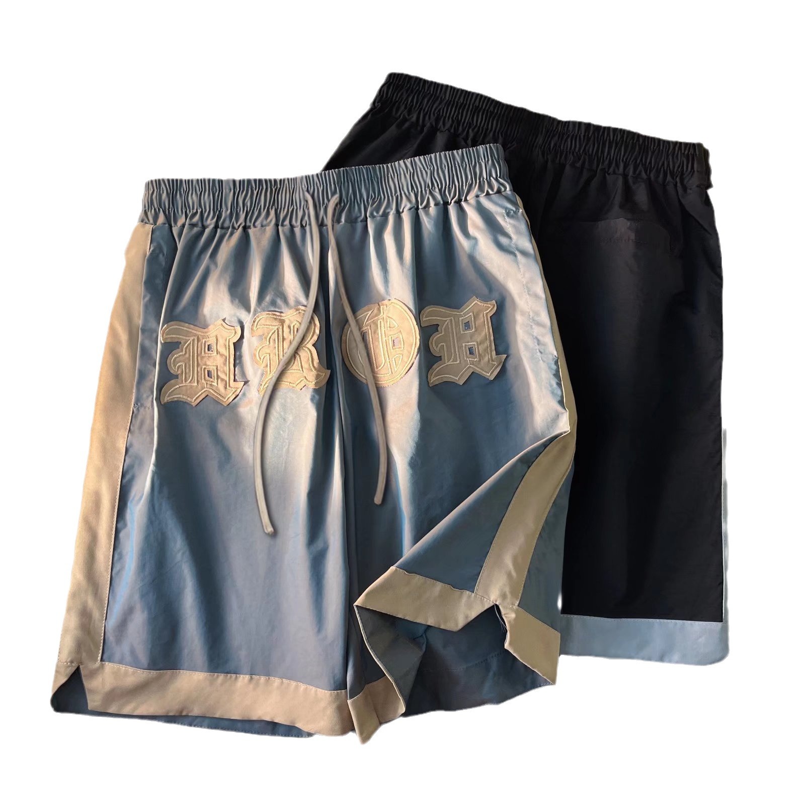 2024 Primavera/Verano Marca de moda callejera europea y americana Nuevos productos Camaleón con sentido de la luz Bordado de color de contraste Moda Deportes Casual Shorts Hombres