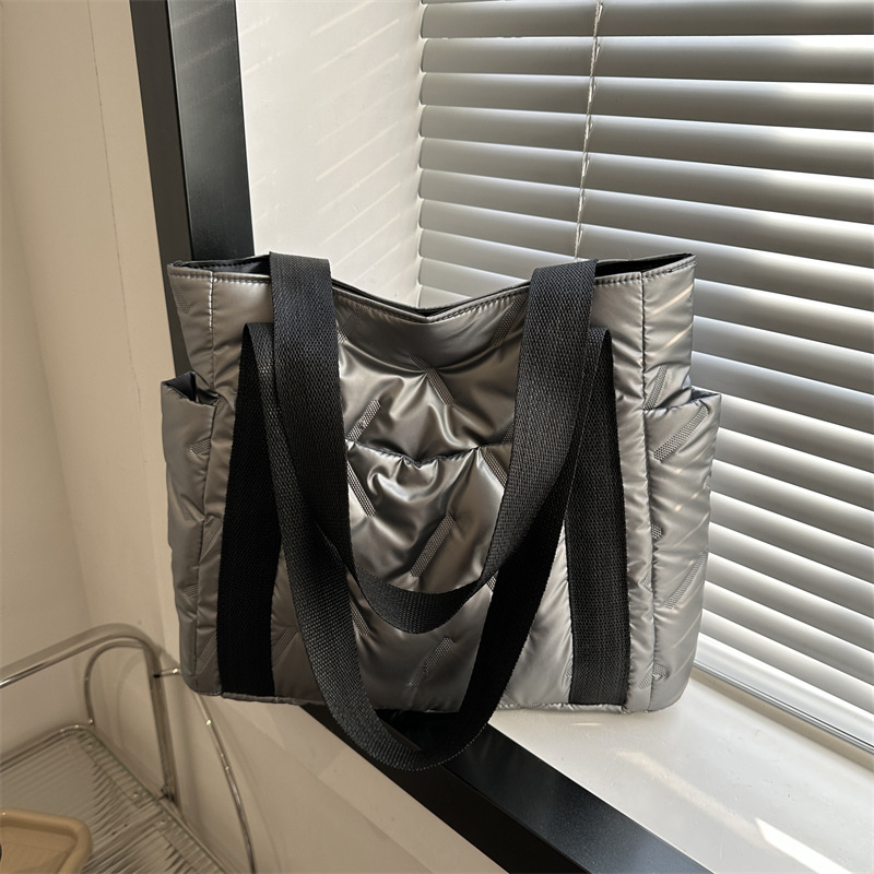 Capacious shoulder bag