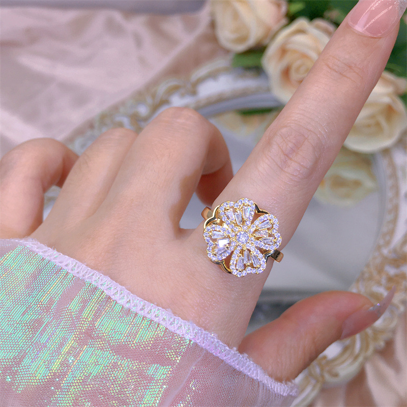 Rotating Moving Ring Flower Zircon Super Flash Ring Opening Color Retention Niche Design Fashion Hand Accessories Female Fashion display picture 3