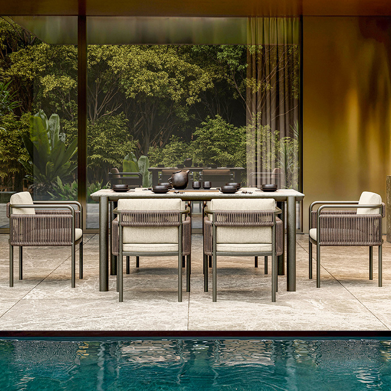 Mesa y silla de ocio al aire libre patio jardín al aire libre muebles impermeables y protectores solares alojamiento residencial hotel chalet percha combinación de silla de caña