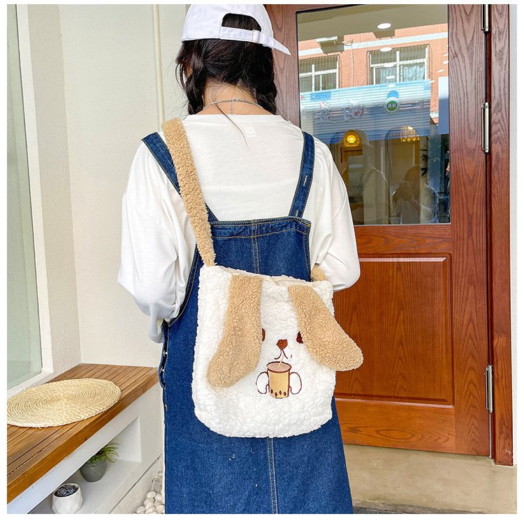 This autumn and winter hand-held bag with big ears, cute animal-embroidered fur, and a simple lambskin large-capacity student backpack undefined