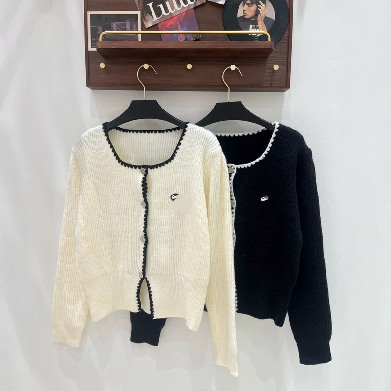 New autumn/winter crochet lace knitted long-sleeved cardigan New autumn/winter crochet lace knitted long-sleeved cardigan