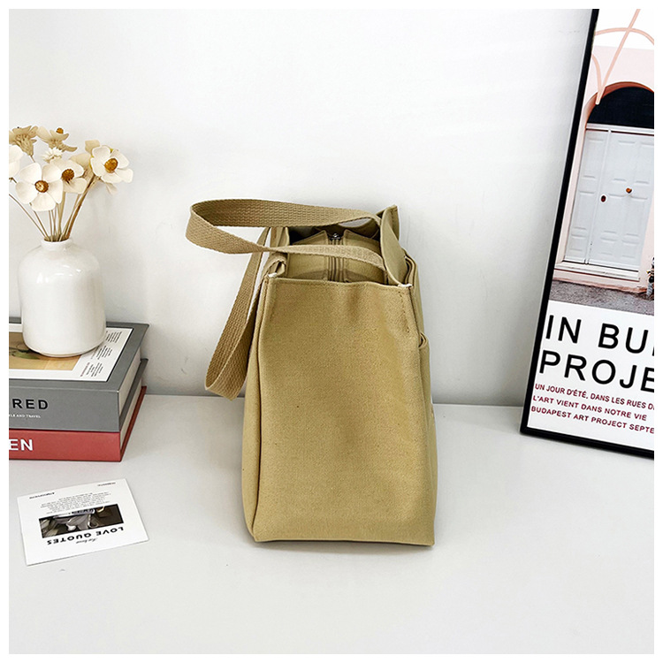 New wholesale fashionable and high-quality canvas handbag, simple and portable, easy to carry for going out, versatile lunch box and bento bag undefined