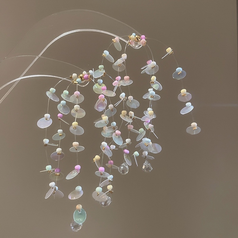 Pendientes de borla de cuentas de arroz de color de dopamina con aguja de plata Nuevos pendientes de todo fósforo Pendientes de niña dulce Sensación avanzada de nicho