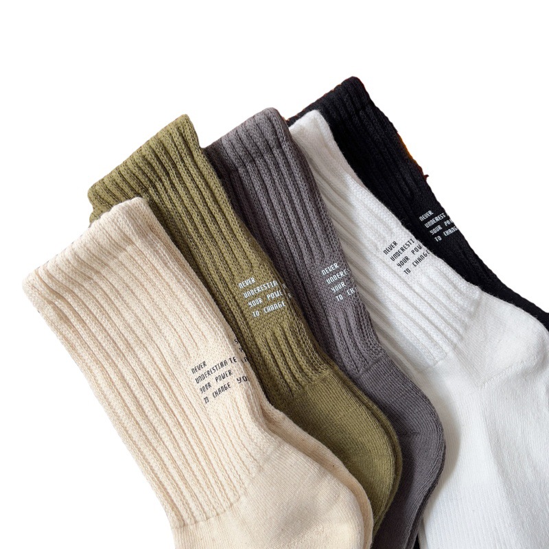 Calcetines de otoño e invierno para mujer de estilo japonés de algodón de aguja gruesa calcetines de media pantorrilla de mujer calcetines de algodón blanco calcetines de pila Zhuji calcetines de mujer al por mayor