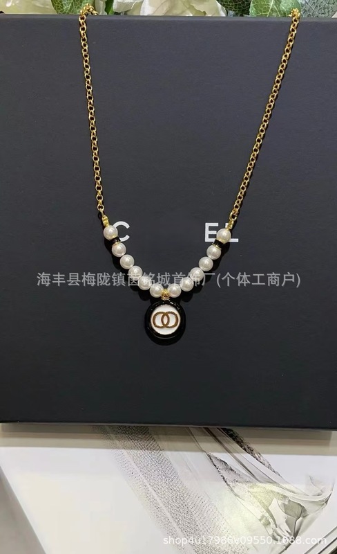 小香家新款高版本双C字母珍珠毛衣链长款爱心蝴蝶结项链厂家批发|undefined
