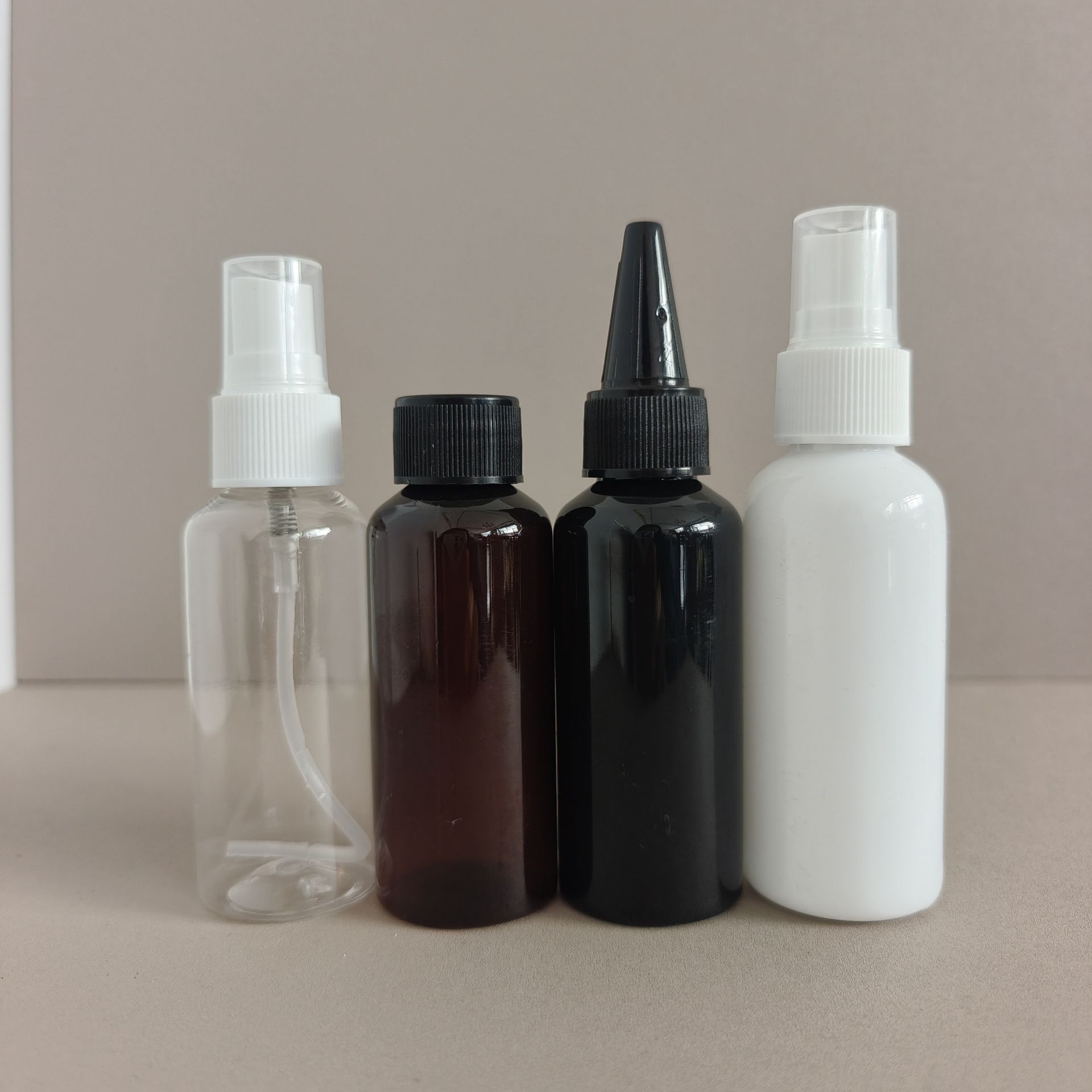 厂家批发60ml塑料喷雾瓶 化妆水喷瓶 液体分装瓶 尖嘴瓶可密封