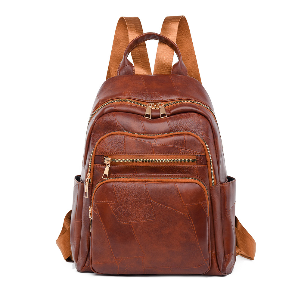 Mochila femenina 2024 nueva mochila de cuero suave simple de gran capacidad bolso ligero de moda bolso de viaje de viaje