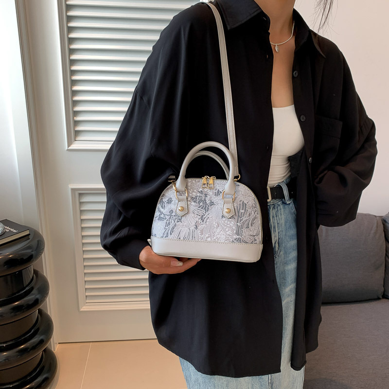 Patrón de moda popular empalme mochila de hombro bolsas de mujer2023 verano nuevo estilo simple bolsas portátiles conchas