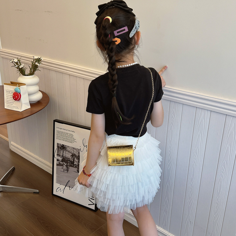 2025 nueva cadena bolsos de moda para niños bolsos de hombro de color sólido para hombres y mujeres bolsos de piedra de estilo extranjero bolsos de mochila para niños