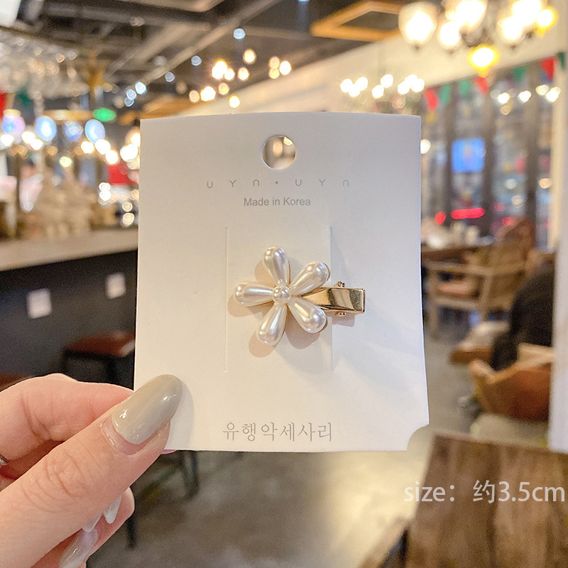 Pasador de pelo de perlas de alta gama estilo francés para mujer, clip para flequillo lateral, elegante clip para el pelo de la frente, accesorio para el pelo tipo pico de pato.