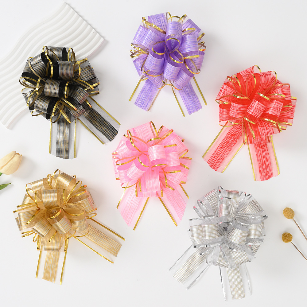 Fábrica directa 50 nuevo hilo de nieve corteza estriado flor de Navidad embalaje de regalos de Hong Kong mano flor perezosa nudo