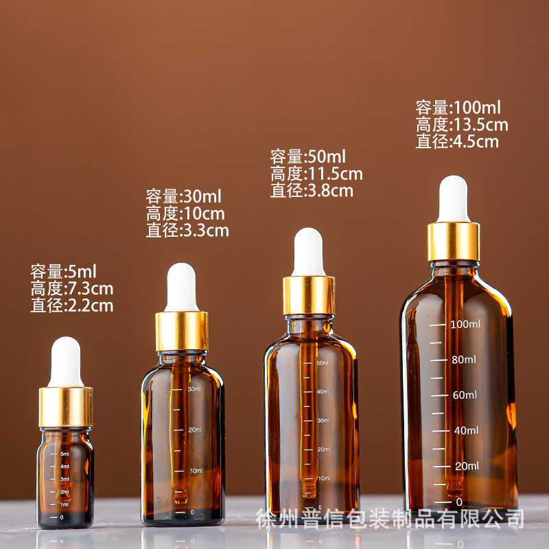 En stock Botella de aceite esencial marrón Botella cuentagotas de 10ml Botella vacía Botella cosmética de vidrio azul Botella secundaria de escala de 30ml
