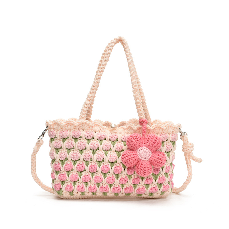 Nuevo paquete infantil transfronterizo ganchillo hecho a mano flores dulces bolsas de hombro para hombres y mujeres viajes de vacaciones bolsas de cestas de verduras portátiles