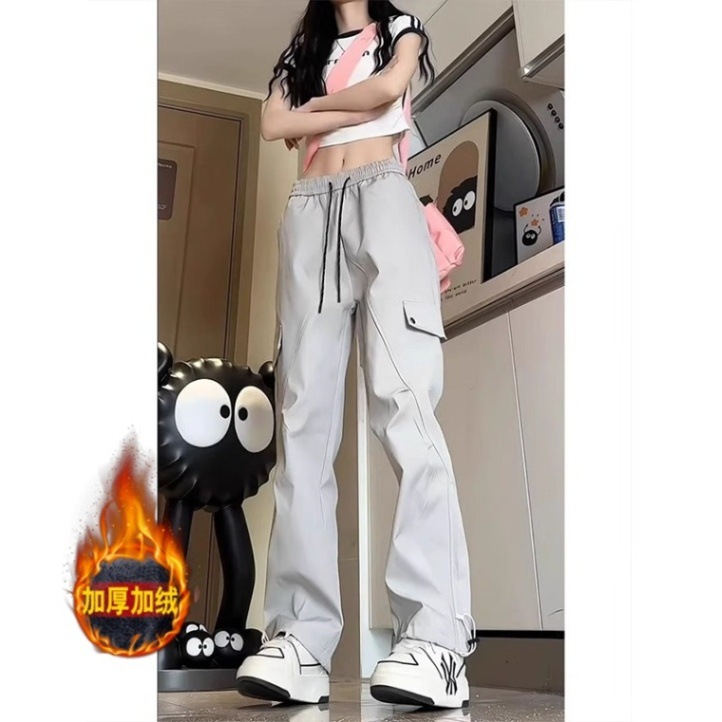 Otoño y invierno explosión de terciopelo más grueso para hombres herramientas de ocio de moda de pantalones deportivos elásticos sueltos de moda para hombres