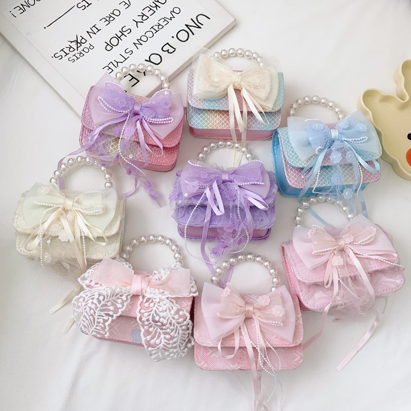 Bolsos de princesa transfronterizos nuevos bolsos de invierno y otoño de encaje de arco de tejido bolsos de mano de chicas cadenas bolsos de mochila accesorios