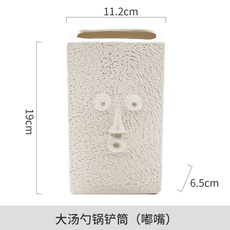 Venta directa de fábrica Soporte de tubo de palillos simple Tubo de cerámica de lujo ligero Adornos cuadrados Cara humana creativa nórdica Tubo de almacenamiento abstracto image 9