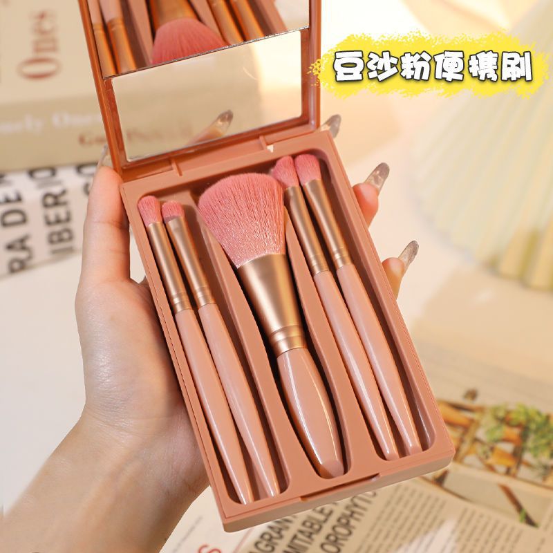 Con un conjunto de cepillo de maquillaje con espejo, un conjunto completo de cabello ultra suave, un conjunto completo de caja de cepillo de sombra de ojos en polvo suelto, un conjunto portátil