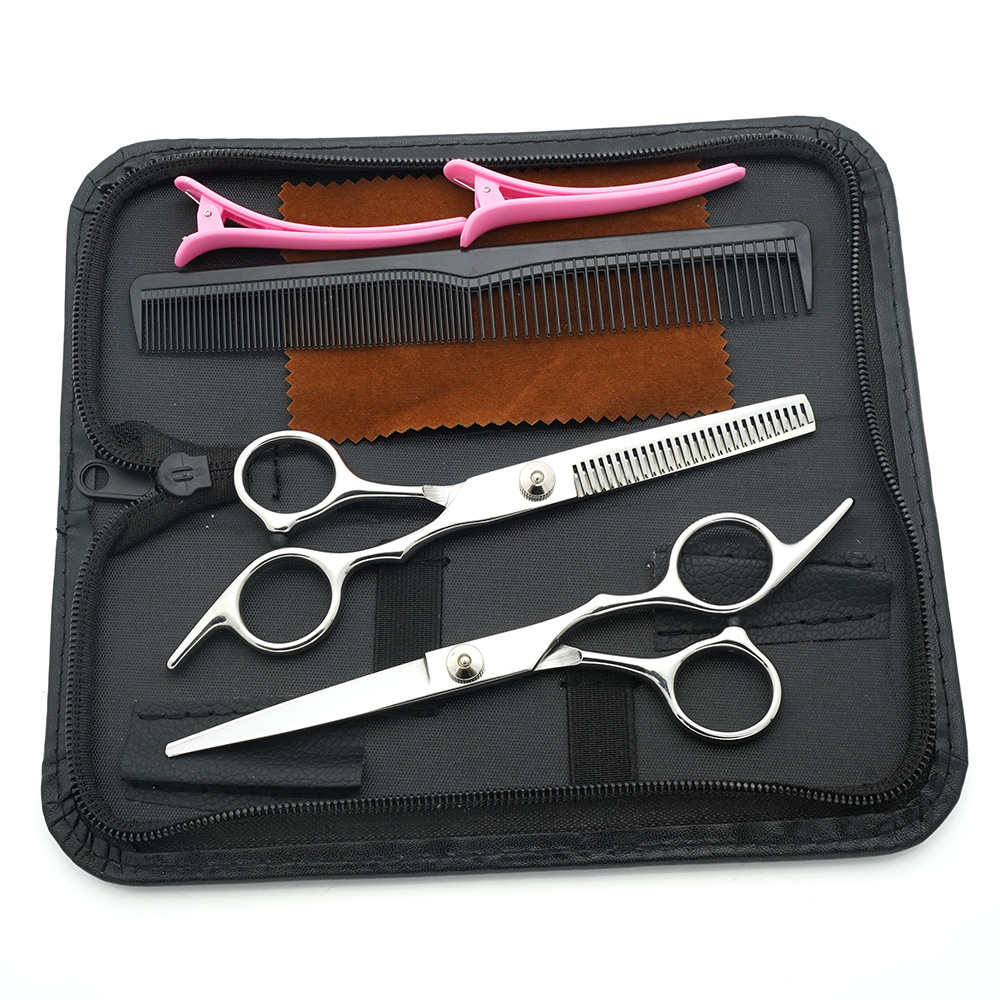 Tijeras de peluquería de 6 pulgadas, negras y doradas, con mango inclinado y de alta calidad, juego de tijeras de peluquería al por mayor para cortar el cabello.