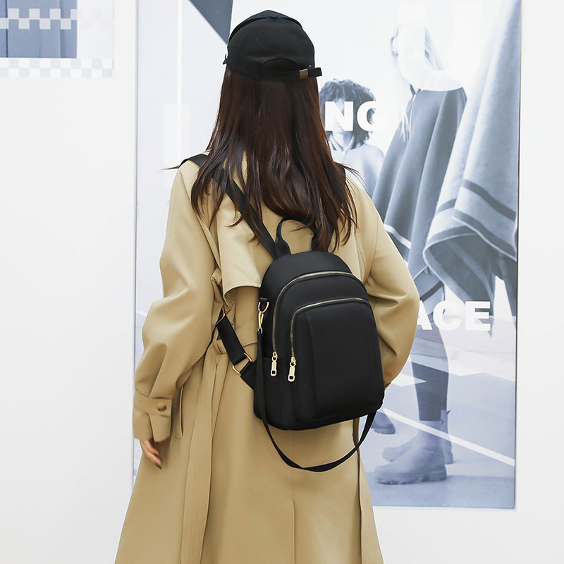 2022 nueva mochila de color sólido simple al aire libre portátil ocio mochila de mediana edad mochila de viaje al aire libre